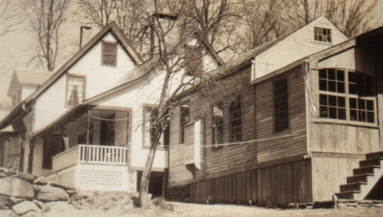 The above photo taken  about 1933 shows the construction of the Southwick herb garden off the end of the back kitchen porch and next to stone steps down into the cellar. 