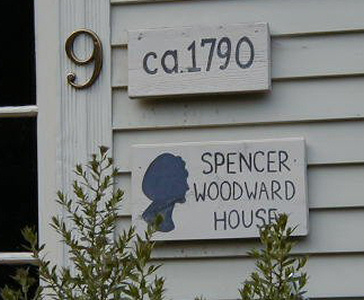Plaque next to door on Spencer Woodward House. Note the Mary Lyon silhouette.  She boarded here while attending grammar school.